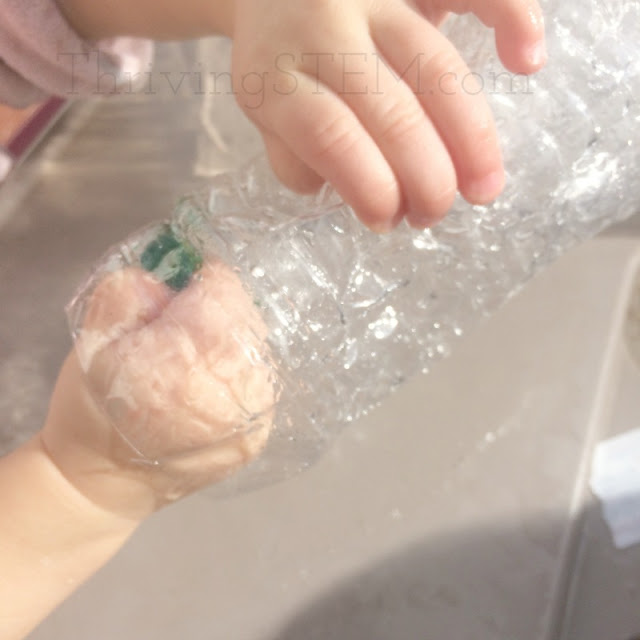 Water play STEM activity to go with your toddler's favorite song