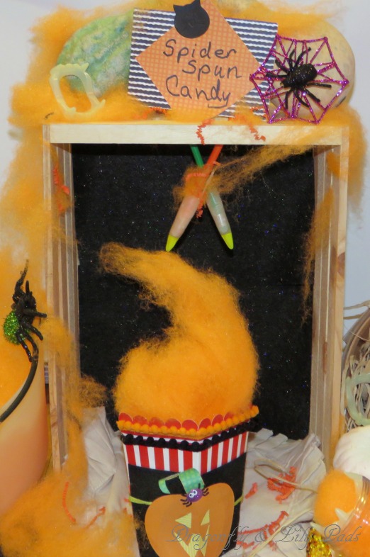 Setting the stage for Spider Spun Candy in World Market Popcorn Box. Spider, Web Decoration, Pencils, Vangs, Fingers