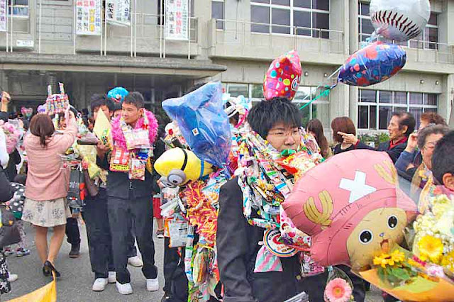 parents, students,uniforms, dolls, toys, candy, balloons