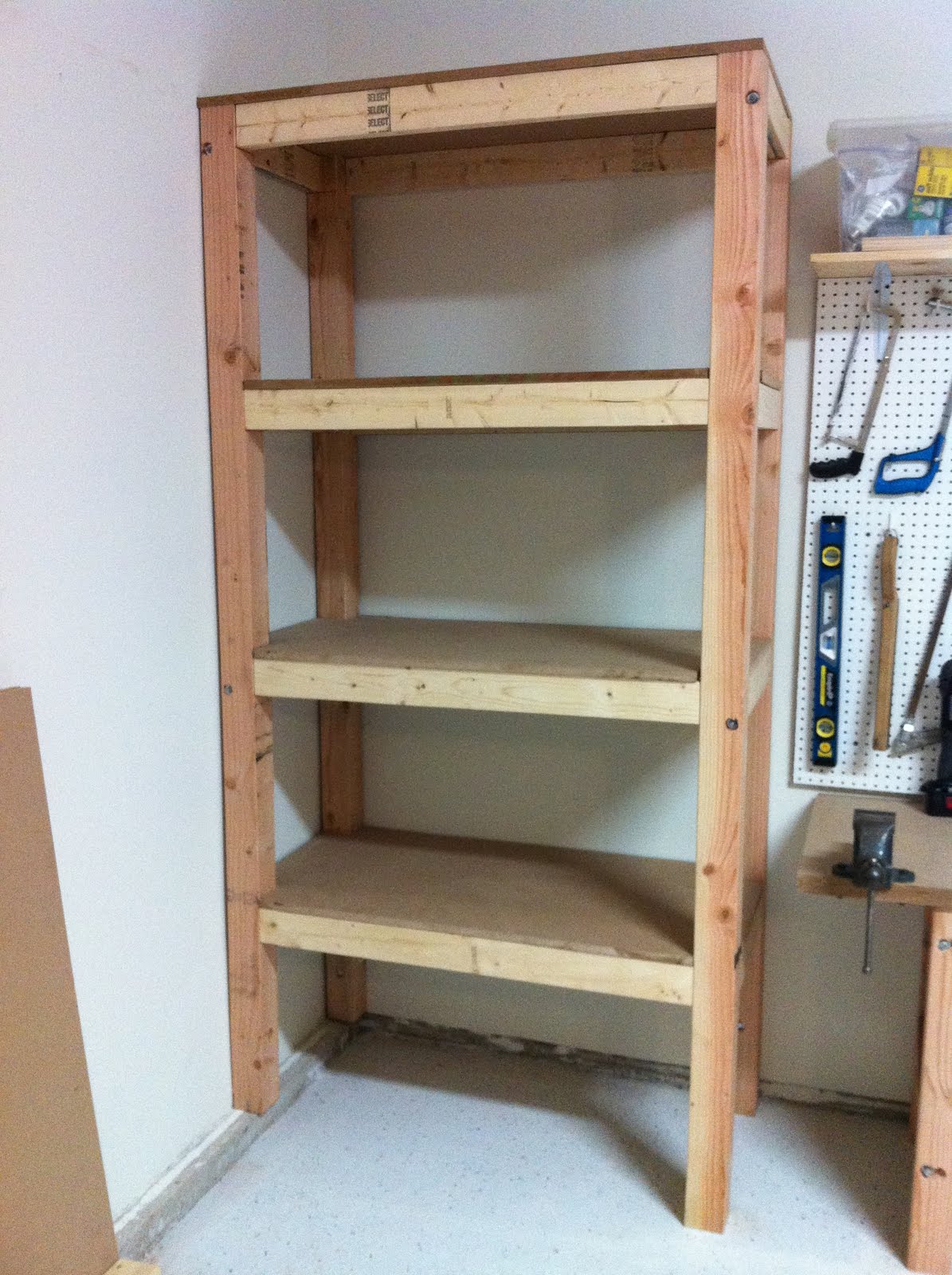Shelves: 3/4' MDF Board Attached to wall studs with 5/16 x 5 lag bolts