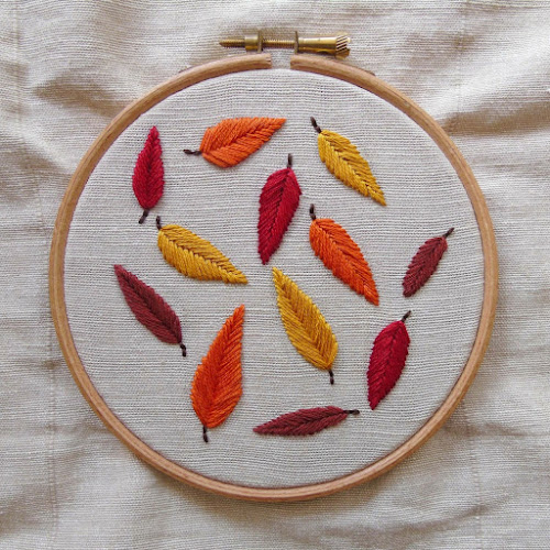 falling autumn leaves created using fishbone stitch