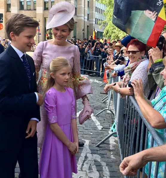 King Philippe, Queen Mathilde, Crown Princess Elisabeth,  Princess Eleonore, Prince Gabriel and Prince Emmanuel at Belgian National Day. Natan Dress, Valentino