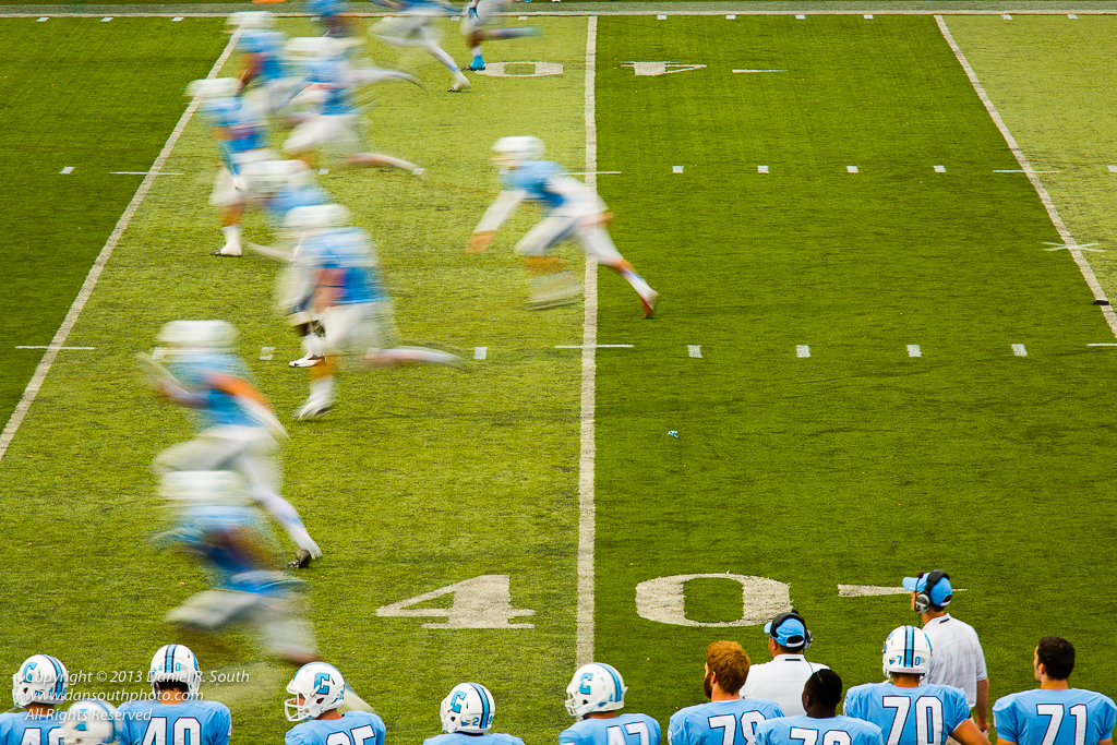 a photo of a football kickoff showing the players in motion in new york daniel south photography