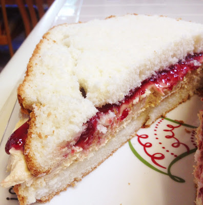 peanut butter and jelly sandwich cake on a platter