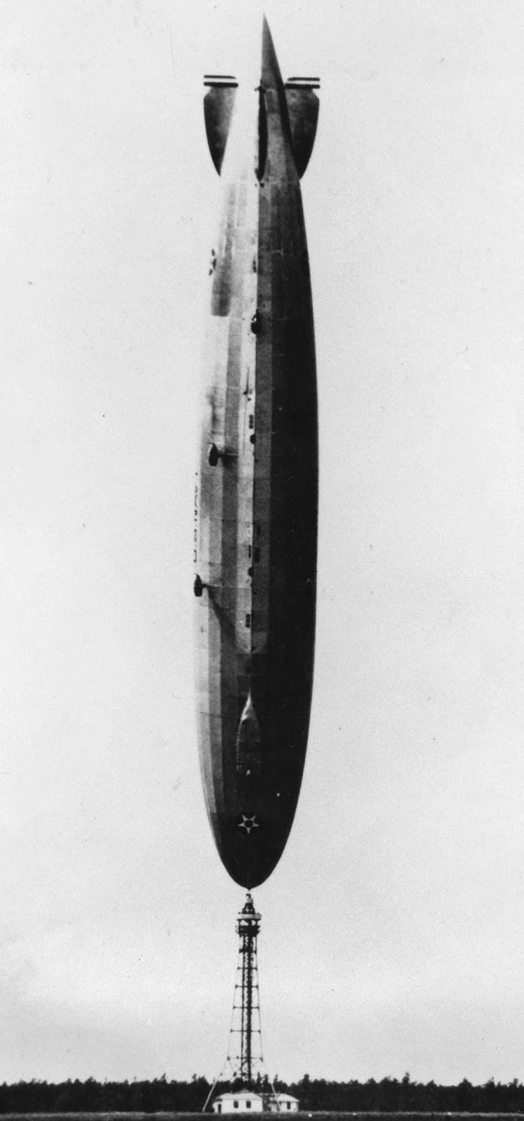 The U.S. Navy's dirigible Los Angeles, upended after a turbulent wind from the Atlantic flipped the 700-foot airship on its nose at Lakehurst, New Jersey, in 1926. The ship slowly righted itself and there were no serious injuries to the crew of 25.