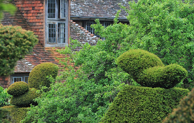 Great Dixter - Peacock Topiary and House