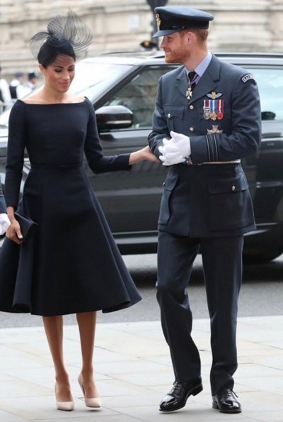 Countess Sophie wore Suzannah Wave Textured Stripe Dress, Meghan Markle wore Dior navy fit and flare dress with bateau neckline. Kate Middleton