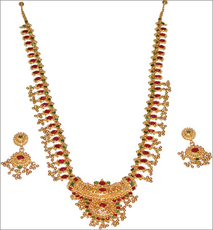 Gold and Diamond jewellery designs: gundmala haaram ( long haaram with ...