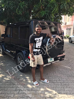 2a Super Eagles star Sylvester Igboun poses with his new $129,000 G-Wagon to celebrate Democracy day (photos)