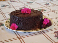 chocolate cake decorated with pink flowers