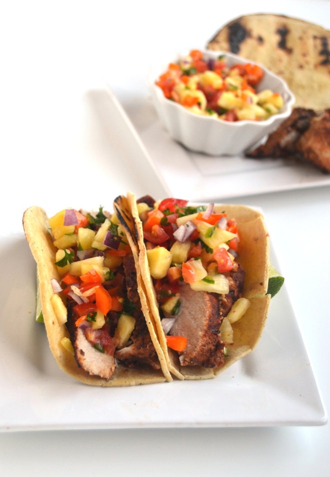 These Grilled Pork Tacos with Pineapple Salsa are perfect for a quick dinner and full of fresh flavors! www.nutritionistreviews.com