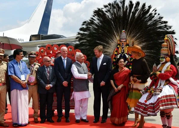 Queen Maxima wore Jan Taminiau short dress. Queen Maxima wore a pattern print silk dress by Jan Taminiau in India