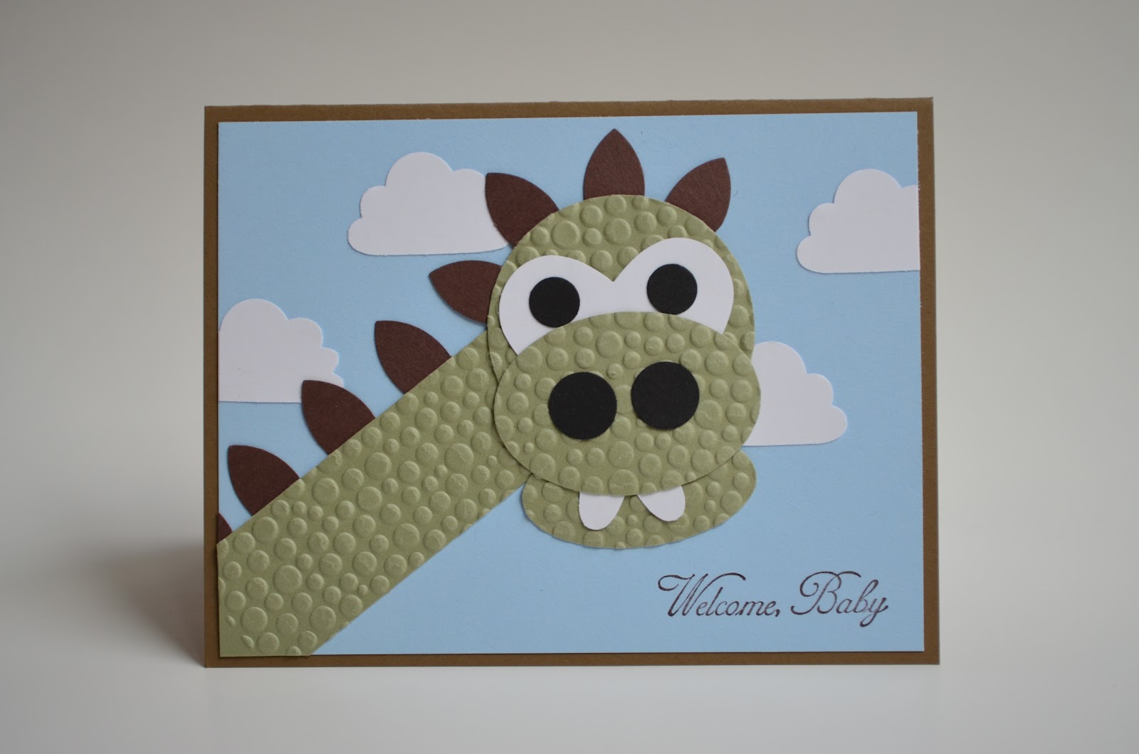 Paper, Pansies and Pachyderms Dinosaur Punch Art Baby Card