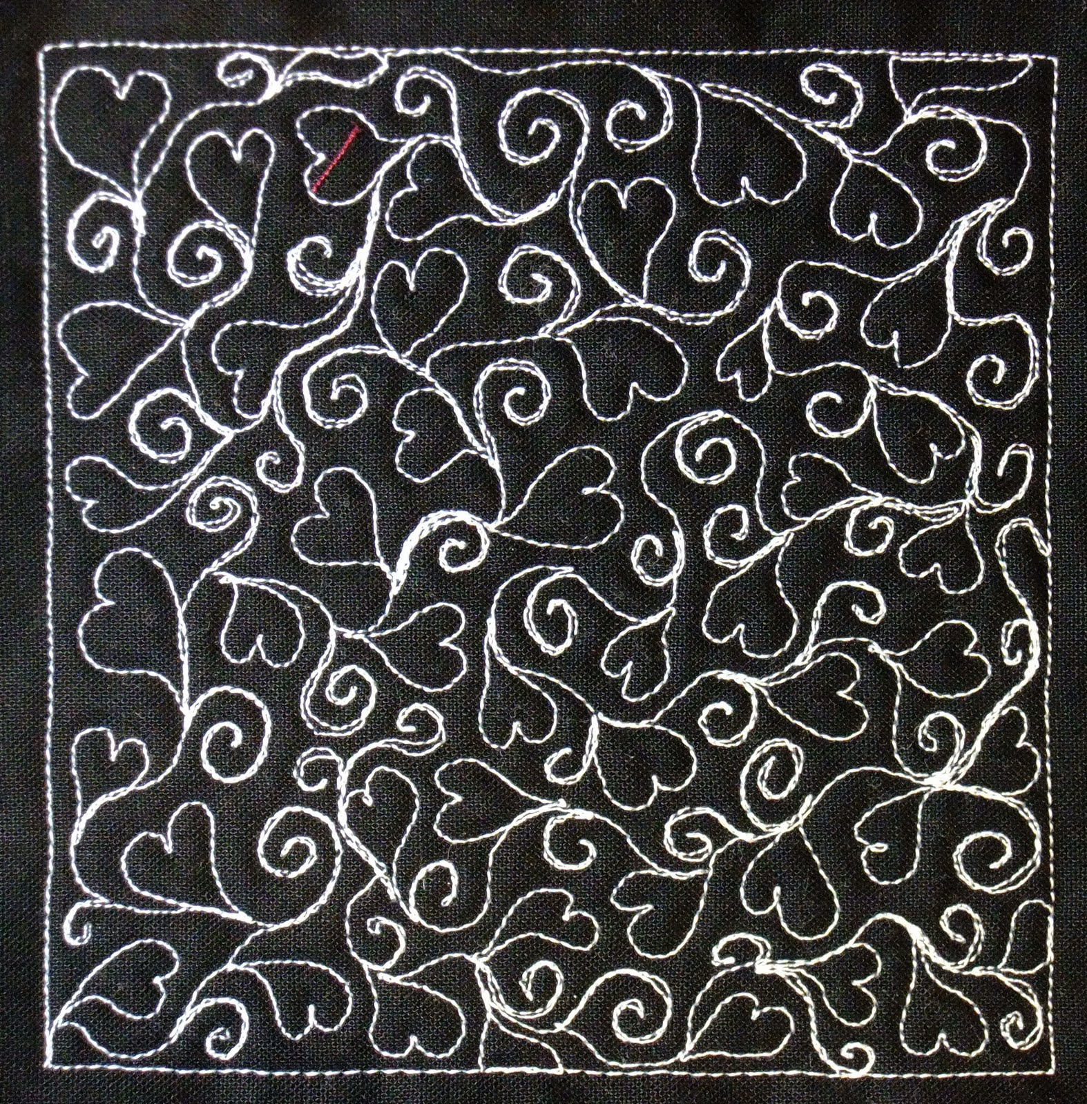 The free motion quilting project day 329 hearts spirals