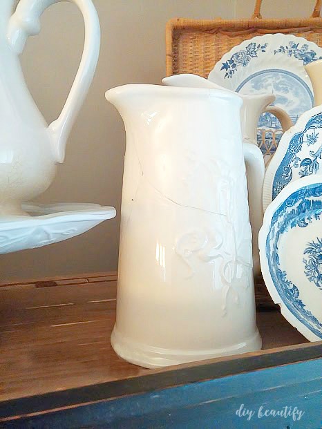 I've an avid dish collector and some of my favorites are my blue and white dishes. Although mismatched, they look beautiful together on this Spring table! Find out more at diy beautify!