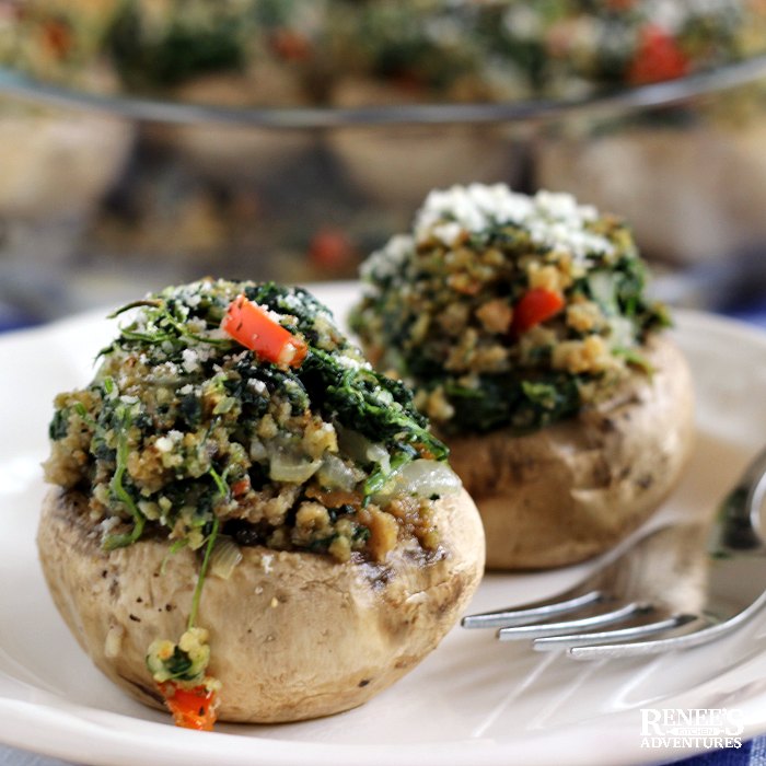 2 Easy Vegetarian Stuffed Mushrooms on plate with fork