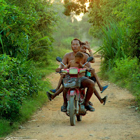 A family on one motobike