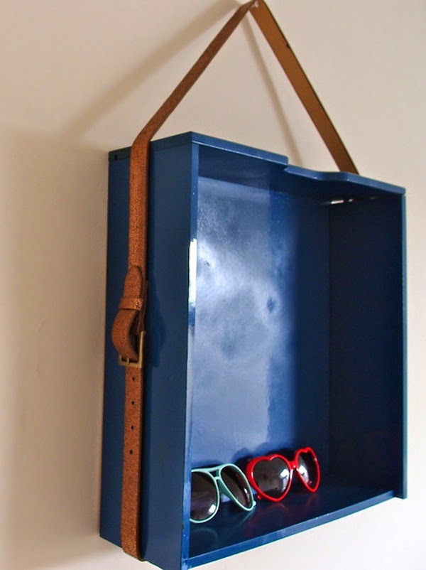 Wooden shelf and recycled belts
