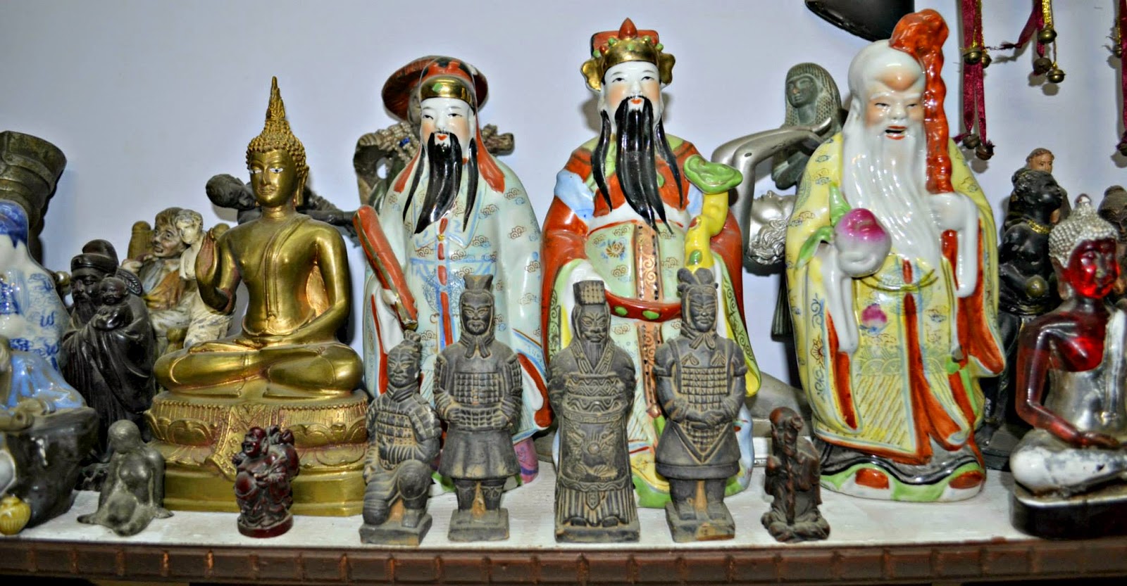 variety of antique figurines