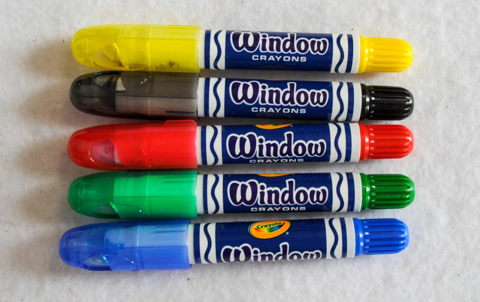 Have you tried these window crayons?? They are so vibrant, and wash of