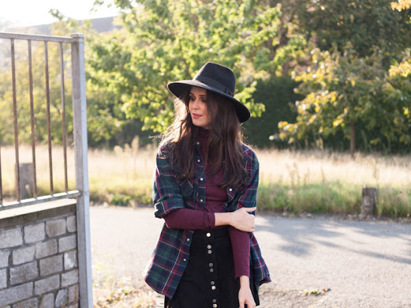 Outfit: wide brim hat, plaid shirt layering