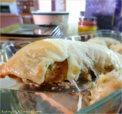 Pepper Jack Chicken: marinated in a spicy dressing, coated in bread crumbs and baked with creamy melted Pepper Jack cheese, a favorite way to serve this dinner is with salsa.| Recipe developed by www.BakingInATornado.com | #recipe #dinner