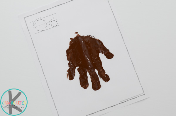 press brown handprint on paper press brown handprint on paper