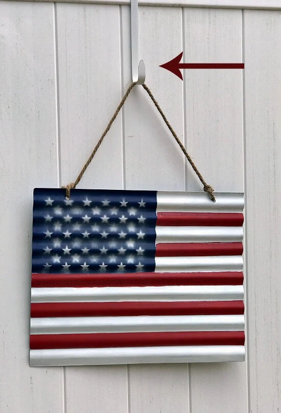 Fence hangers and a corrugated flag