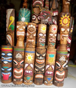 Carved wood tiki masks and tiki wood statues from Bali