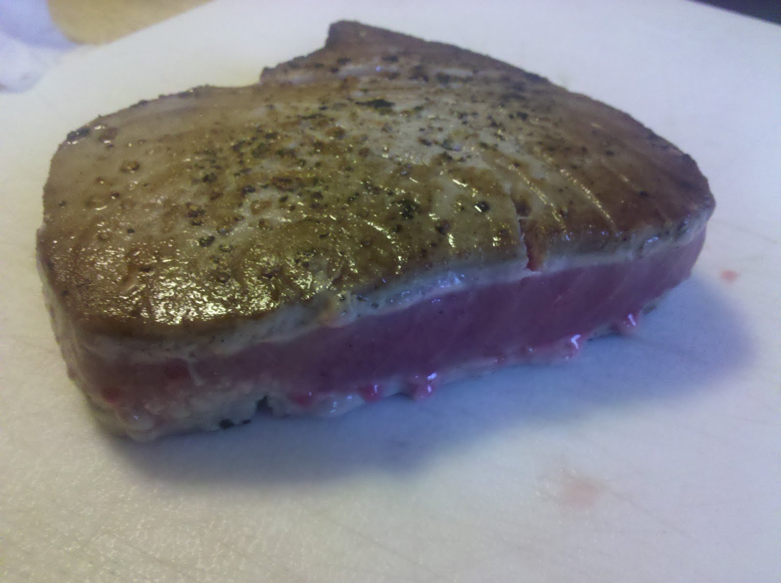 the existential chef Tuna steaks au poivre with french onion sauce and