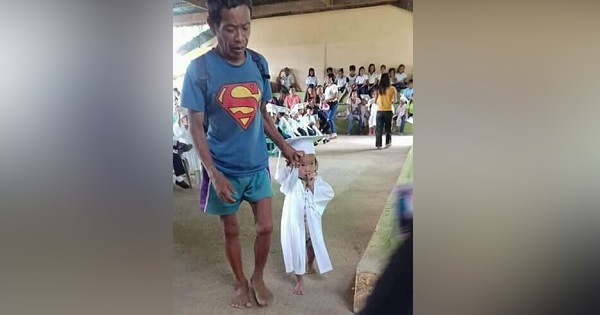 Construction worker dad goes viral as he goes barefoot to his daughter’s graduation