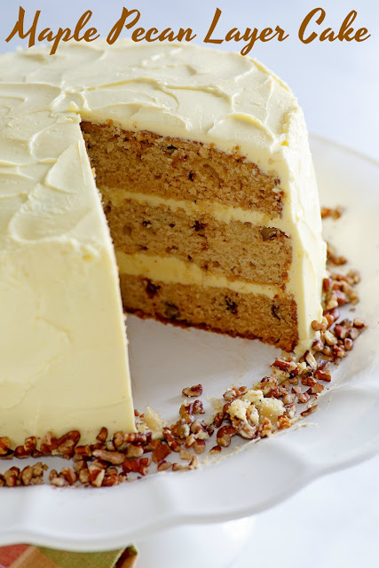 This lovely cake is the perfect combination of flavors and textures. The warm maple syrup blends perfectly with pecans for an out of this world cake, the maple frosting is amazing too! Dessert is served and it's delicious! This lovely cake is the perfect combination of flavors and textures. The warm maple syrup blends perfectly with pecans for an out of this world cake, the maple frosting is amazing too! Dessert is served and it's delicious!