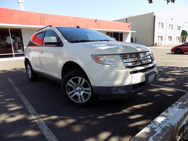 2008 Ford Edge before body repairs & color change at Almost Everything Auto Body.