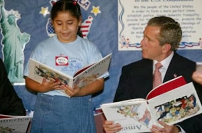 Bush Reading a Book upside down