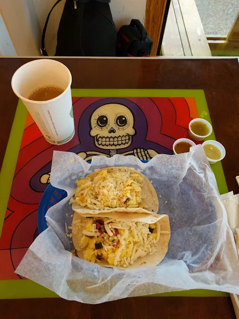 Breakfast tacos and coffee at Tacodeli in Austin, Texas