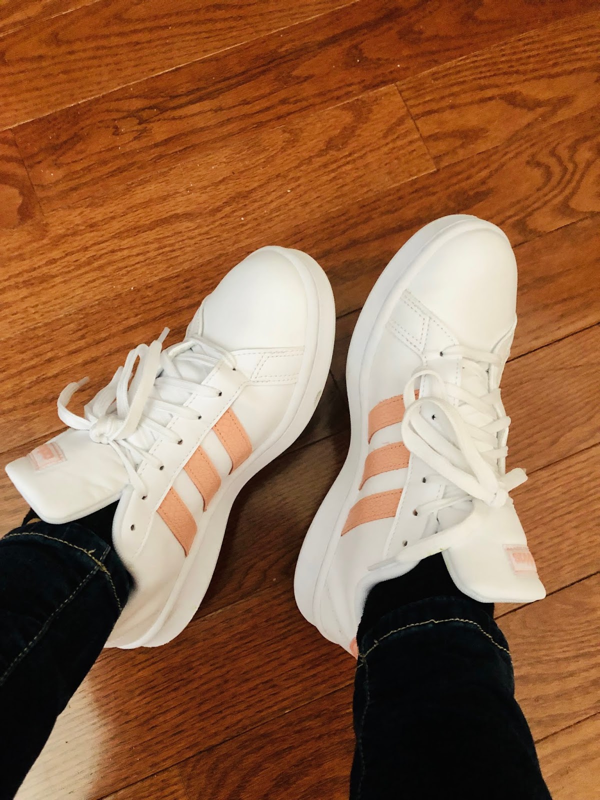 adidas white shoes with pink stripes