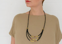 http://www.makery.uk/2015/11/diy-rubber-brass-tube-necklace/
