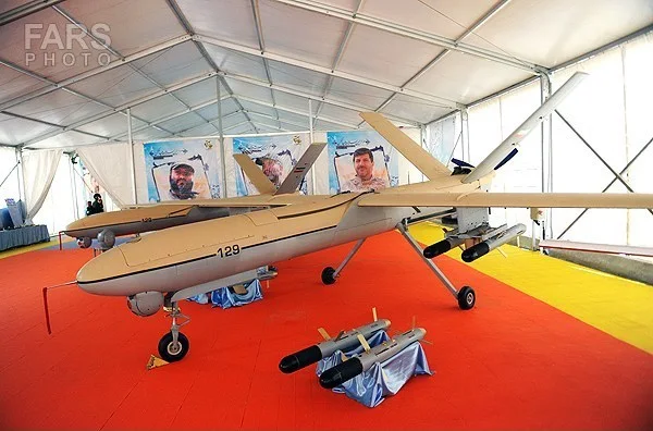 Image Attribute: Iranian Shahed 129 UCAV (first generation) at an IRGC-ASF arms expo 2014 / Source: FARS News Agency (Creative Commons Attribution 4.0 International License)