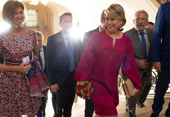 Maria Teresa wore a matching pink jacket and dress by Paule Ka