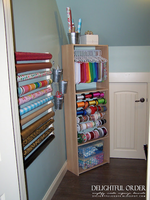 That’s all it takes to make this easy and affordable wall-mounted gift wrap center. A Bowl Full Of Lemons Most any unused space you have can be turned into a gift wrapping station.