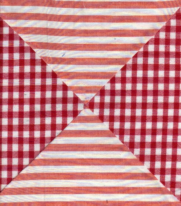 Quilt block in red stripes and checks shows different color background