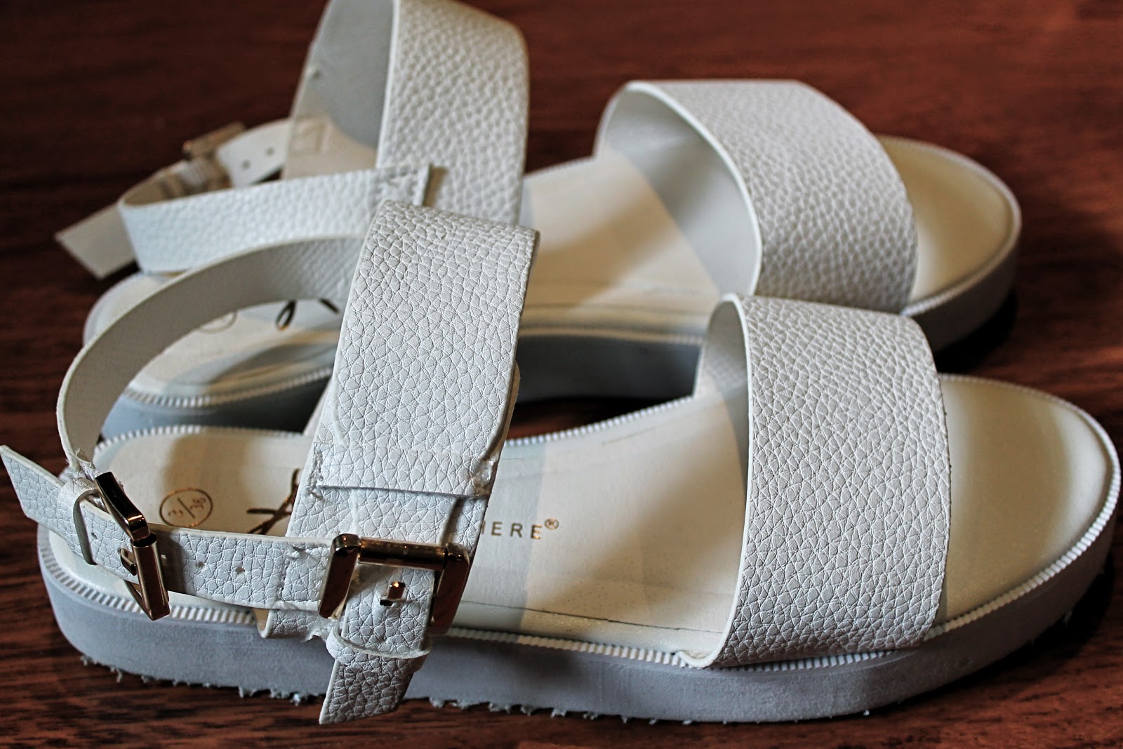 White Platformed Sandals.