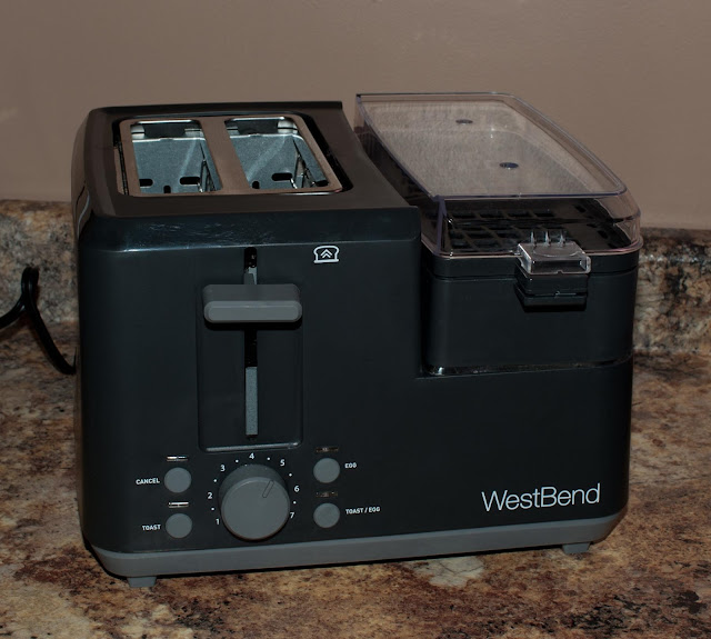 A single small appliance that cooks eggs and toasts bread or buns at the same time.
