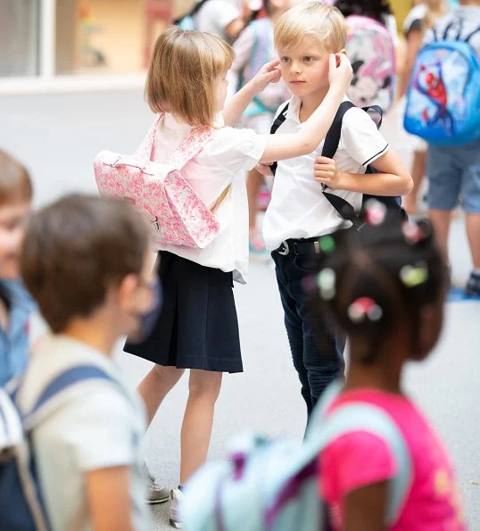 Prince Jacques and Princess Gabriella, twins of Prince Albert and Princess Charlene, started first day of school at Stella School. pink satchel