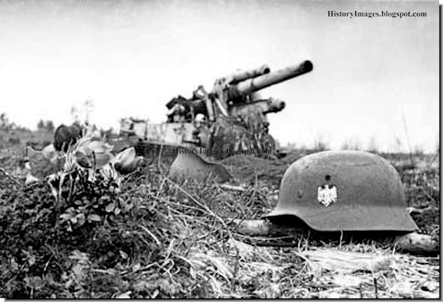 A destroyed German gun and a German grave in Belarus