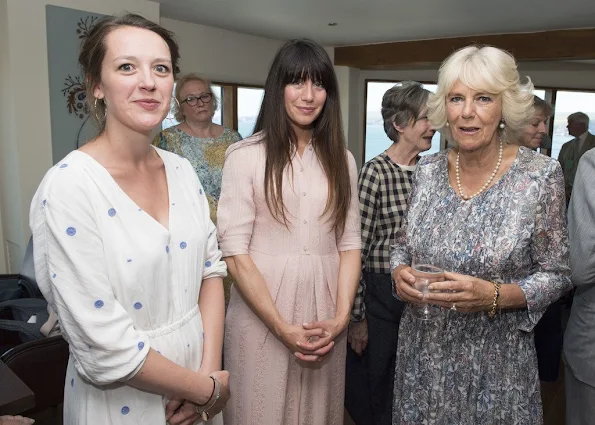 Prince Charles and Duchess Camilla met with members of the TV show 'Doc Martin' at Nathan Outlaw's restaurant