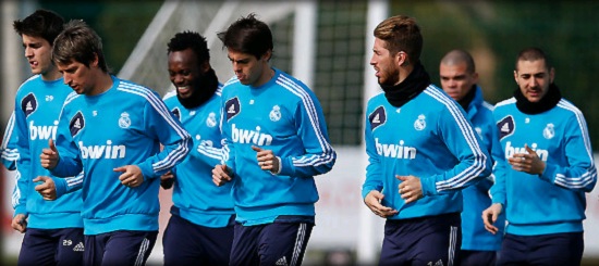 Real Madrid players training with blue jersey