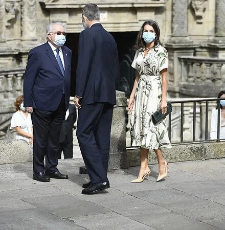 Queen Letizia wore a new printed shirt dress from Pedro del Hierro, and nude patent leather slingback pumps from Carolina Herrera