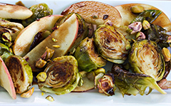 Roasted Brussel Sprouts with Pistachios, Fuji Apple and Honey Balsamic Vinegar Reduction