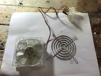Computer fan with metal grill 